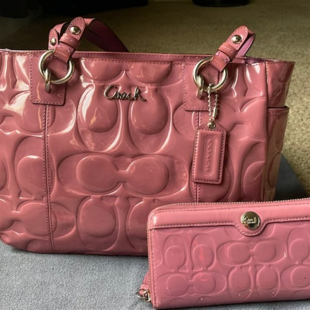 Pink Signature Coach handbag and wallet